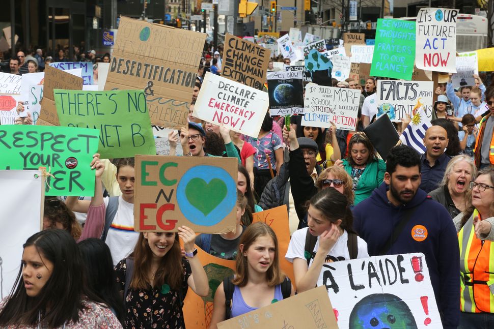 One of the top issues for young voters this federal election is climate change, polls suggest. In this photo, hundreds of Canadian youth protest in Toronto on May 24, 2019.