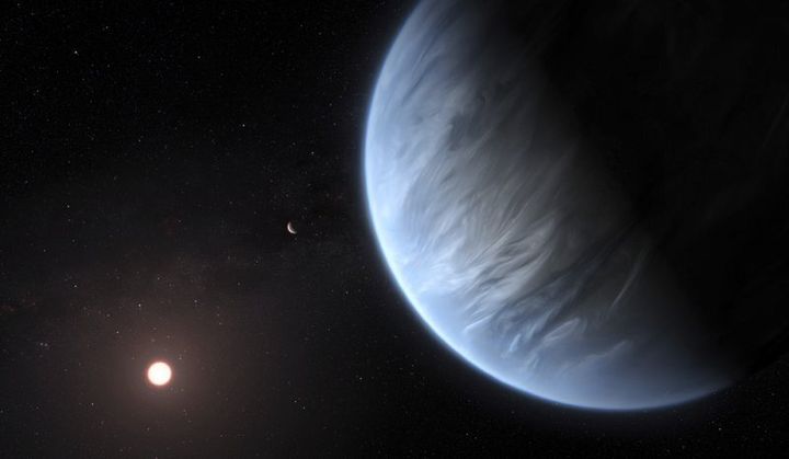 This artist's rendering provided by University College London Centre for Space Exochemistry Data researchers shows Exoplanet K2-18b, foreground, its host star and an accompanying planet in this system. On Wednesday, the scientists announced they discovered water on the planet outside our solar system that has temperatures suitable for life.