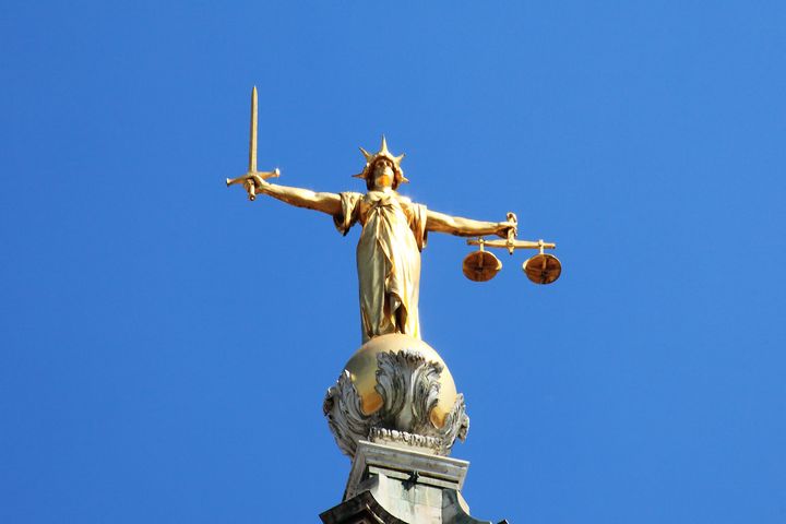 Scales of Justice of the Central Criminal Court fondly known as The Old Bailey in the city of London, England, UK
