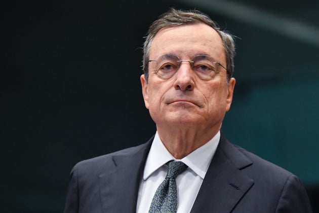 European Central Bank President Mario Draghi looks on during an Eurogroup meeting at the European Commission,...