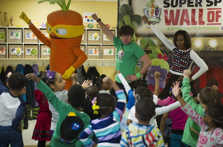 Former first lady Michelle Obama during a visit to La Petite Academy child care center in Bowie, Maryland, on Feb. 27, 2014, as part of the Let's Move campaign.