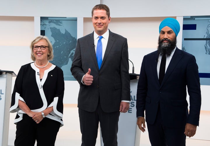 Green Party Leader Elizabeth May, Conservative Leader Andrew Scheer, and NDP Leader Jagmeet Singh pose for a photo before the Maclean's/Citytv National Leaders Debate in Toronto on September 12, 2019.