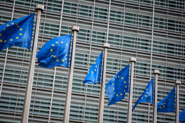 European flags in front of the Berlaymont building in Brussels, Belgium