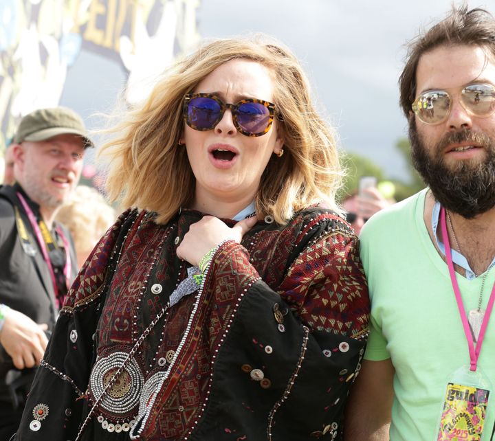 Adele with her husband Simon Konecki backstage at The Pyramid Stage at the Glastonbury Festival, at Worthy Farm in Somerset.