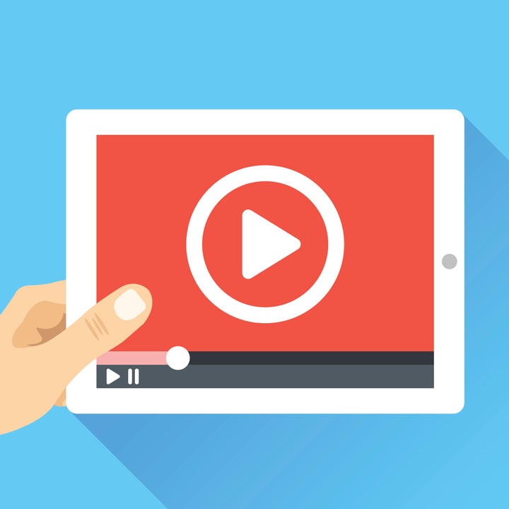 Hand holding tablet with video frame and play button. Video marketing, online cinema. Modern flat illustration, flat design elements for web banners, web sites, infographics. Vector illustration（イメージ写真）