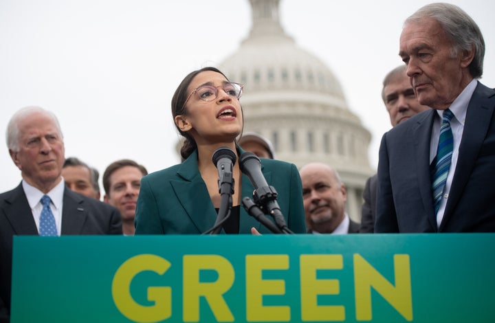 Rep. Alexandria Ocasio-Cortez (D-N.Y.) joins Sen. Ed Markey (D-Mass.), right, to announce Green New Deal legislation in February.