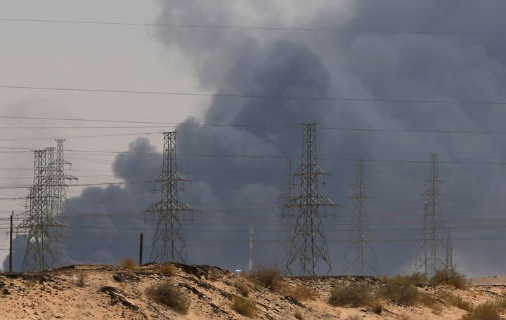 Smoke is seen following a fire at an Aramco factory in Abqaiq, Saudi Arabia.