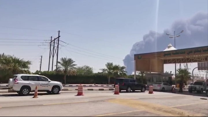 This AFPTV screen grab from a video shows smoke billowing from an Aramco oil facility in Abqaiq.