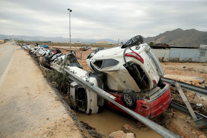 New cars are seen piled after a flood caused by torrential rains in Orihuela, Spain, September 14.