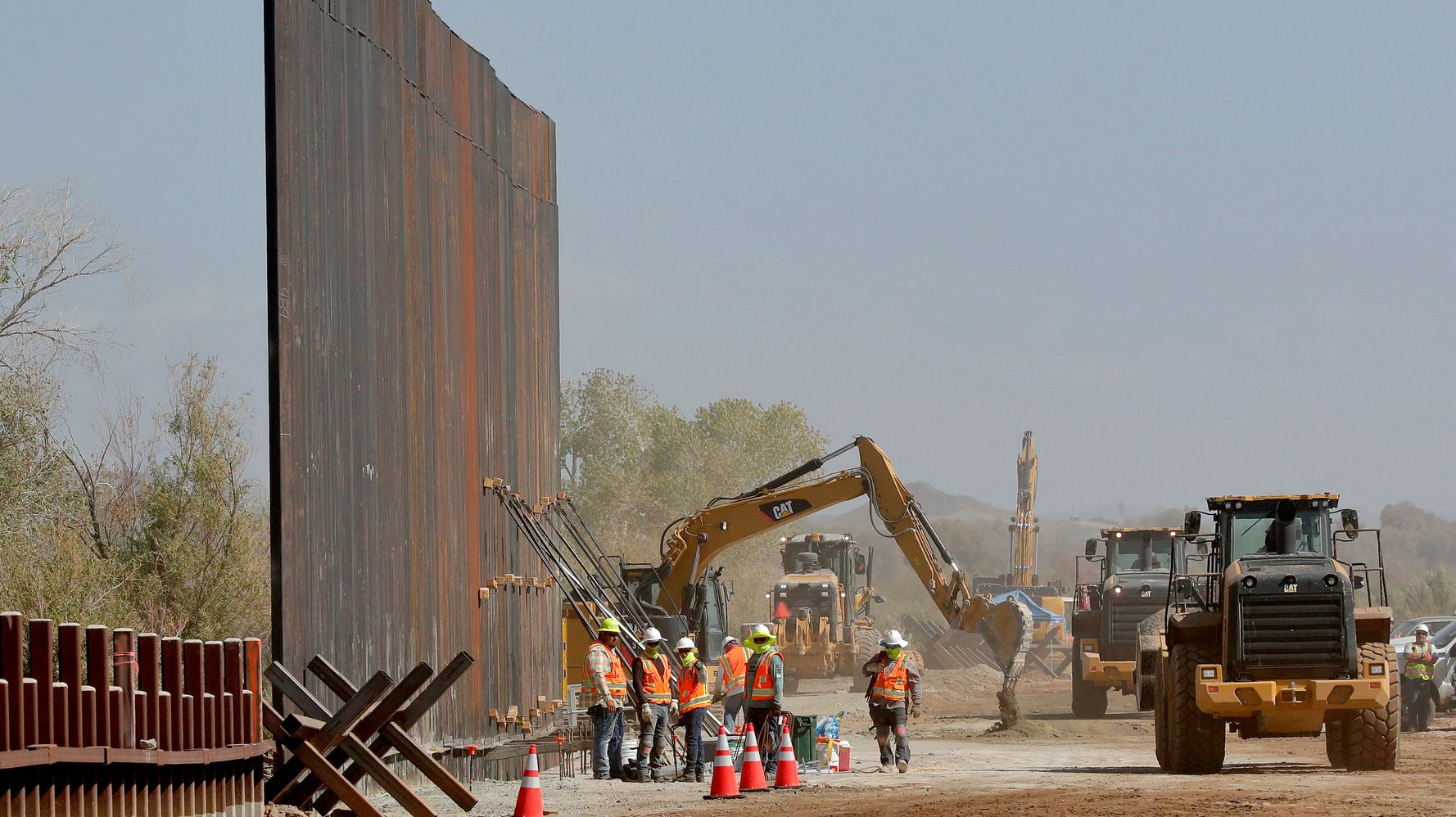 Trump Administration Cutting 20 Miles Of Extra Border Wall Because It Lacks Funds: Report