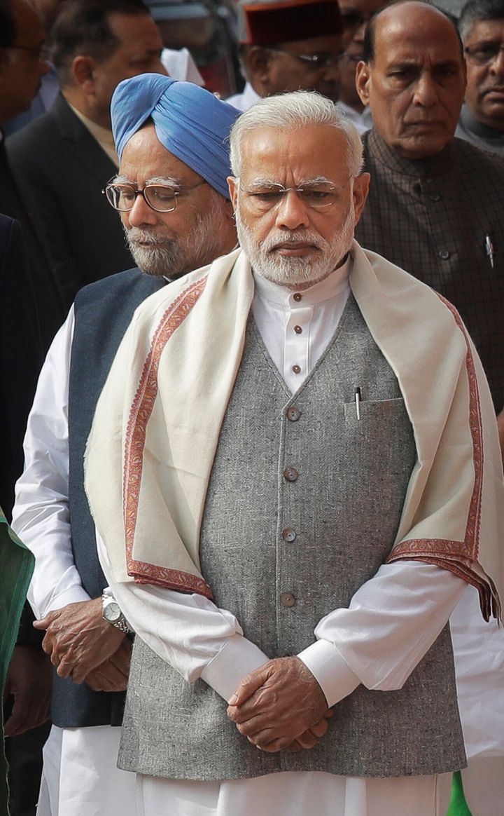 Prime Minister Narendra Modi, front, and former Prime Minister Manmohan Singh in a file photo. 