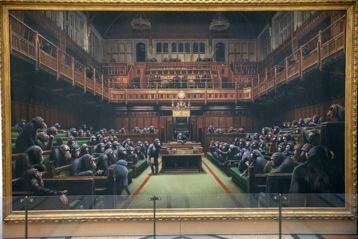 The painting 'Devolved Parliament' by the graffiti artist Banksy, which is going on show at Bristol Museum.