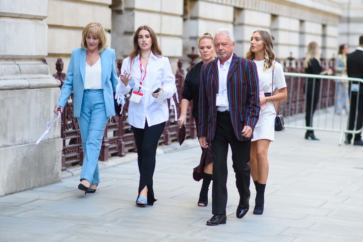 Jackie Adams, Anthony Adams and Louise Adams arriving at the Victoria Beckham catwalk show, during Spring/Summer 2020 London Fashion Week.
