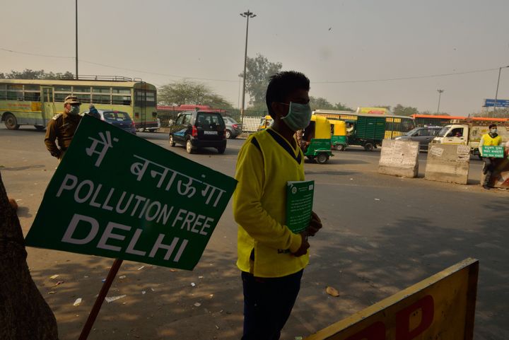 Volunteers implementing odd-even rule at New Delhi's Anand Vihar on January 5, 2015.