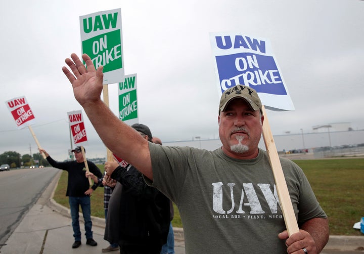 General Motors assembly worker Scott Gribson pickets outside the General Motors Powertrain Flint Engine plant during the national strike in Flint, Michigan, Sept. 16, 2019. REUTERS/Rebecca Cook