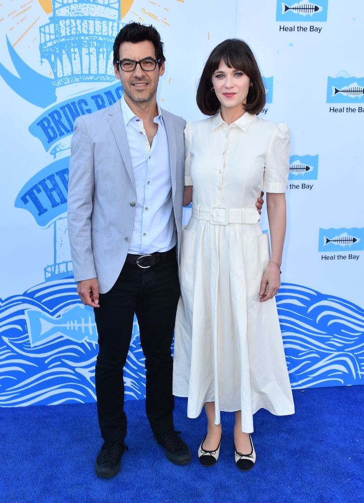 Jacob Pechenik and actress Zooey Deschanel attend an event together in May 2018.