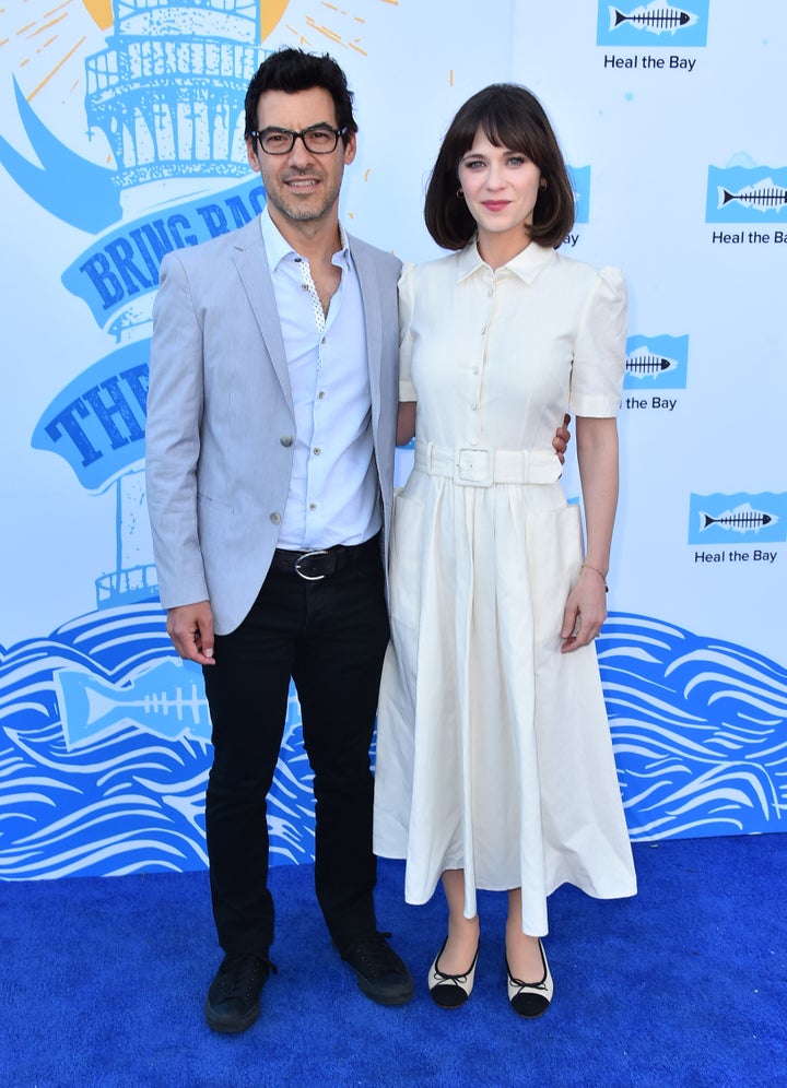 Jacob Pechenik and actress Zooey Deschanel attend an event together in May 2018. 