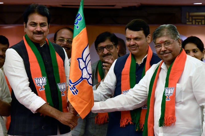 Former Congress Minister Harshvardhan Patil with Maharashtra CM Devendra Fadnavis and State President BJP Maharashtra Chandrakant Patil 