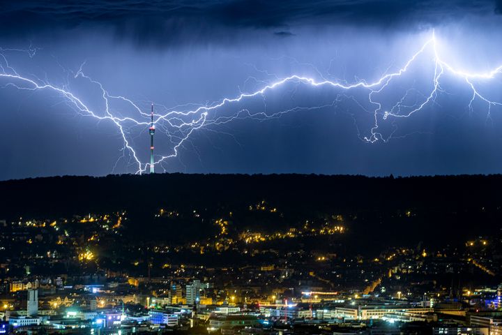 Lightning appears over Stuttgart, Germany, in July 2019 as the heatwave in large parts of Europe gives way to storms and heavy rain.