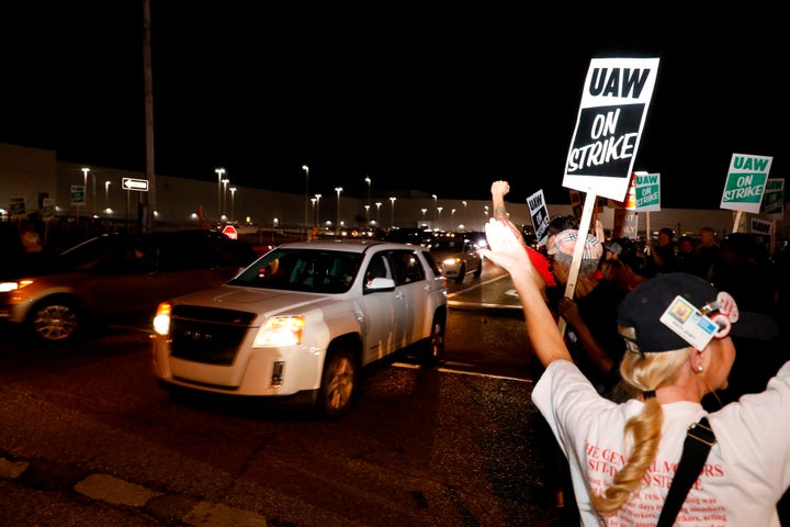 Workers exiting the GM plant in Flint, Michigan, early Monday morning.