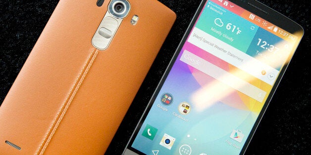 The leather-covered LG G4, left, is displayed next to an LG G3, Tuesday, April 28, 2015 in New York....