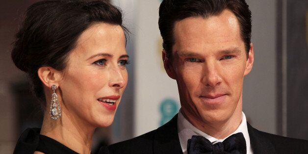 Actor Benedict Cumberbatch and fiance Sophie Hunter pose for photographers on arrival at the EE British...