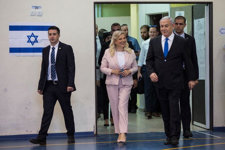 Israeli Prime Minister Benjamin and his wife Sarah arrive at a voting station in Jerusalem on Sept. 17, 2019. 