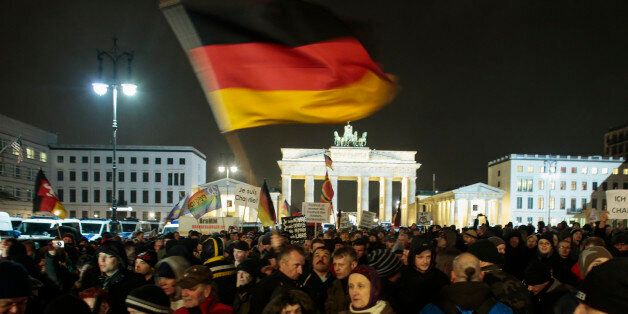 Participants of a rally called 'Berlin Patriots against the Islamization of the West' (BAERGIDA), a group...