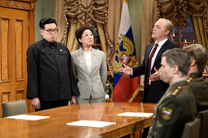 Bowen Yang as Kim John Un, Host Sandra Oh as a North Korean Interpreter and Beck Bennett as Vladimir Putin 'SNL.'