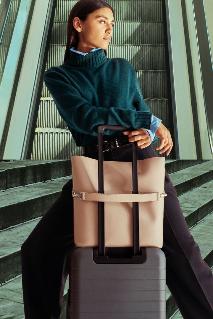 Away's new travel tote attaches to your suitcase.