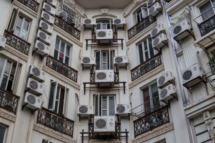 Apartment buildings are covered with air conditioning units in Tianducheng, a residential community in Zhejiang Province, China.
