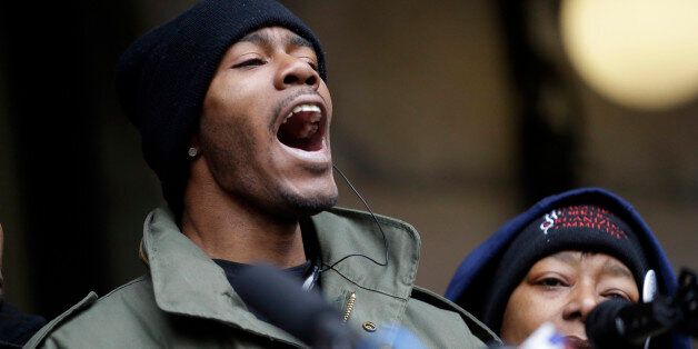Dontre Hamilton's brother, Nate Hamilton yells on the steps of the federal courthouse Monday, Dec. 22,...