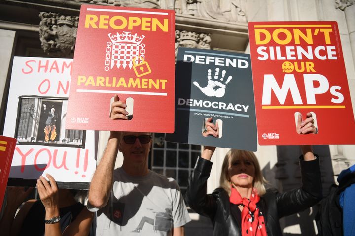 Protesters outside the Supreme Court in London where judges are due to consider legal challenges to Prime Minister Boris Johnson's decision to suspend Parliament.