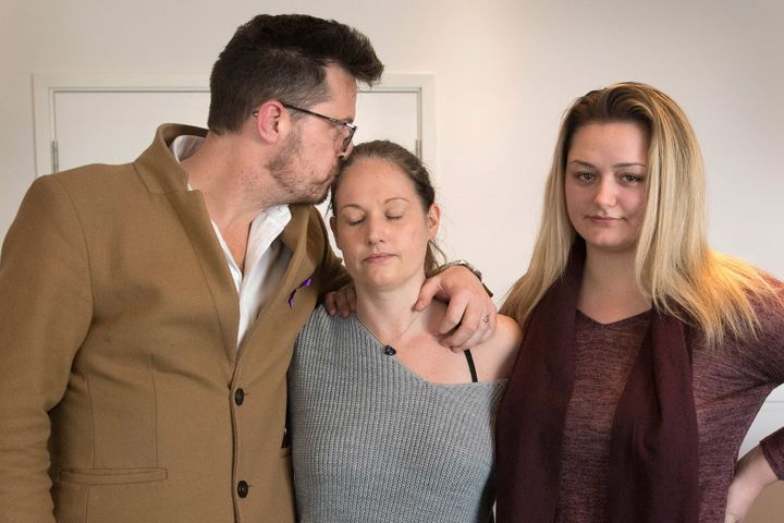 Family members, father Peter, stepmother Joanne and sister Lucy, of murdered teenager Jodie Chesney at New Scotland Yard in London.