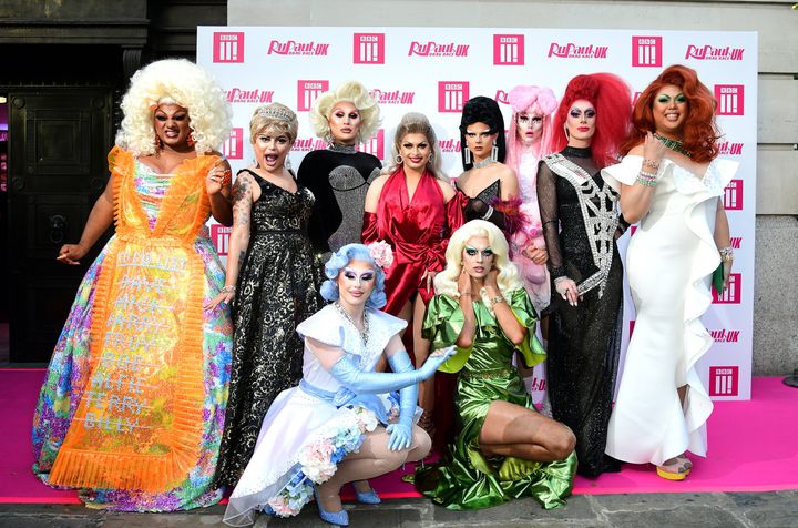 The 10 queens pose together on the runway