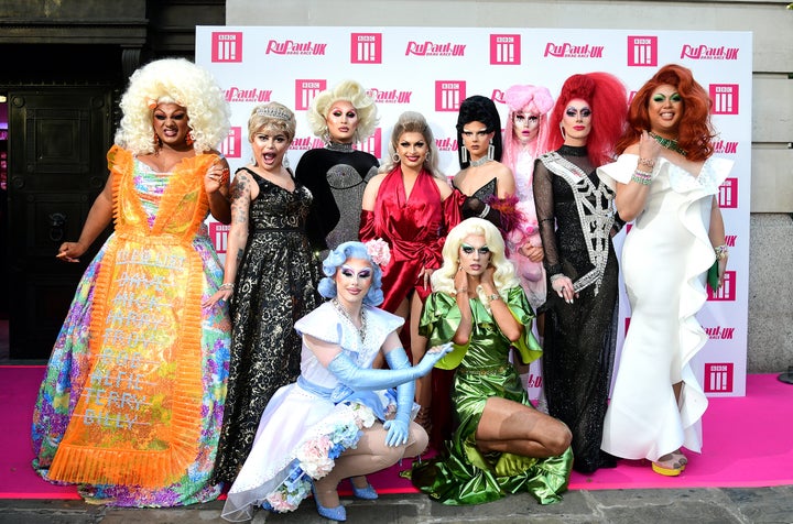 The 10 queens pose together on the runway