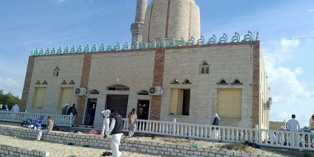 View of the Rawda mosque, roughly 40 kilometres west of the North Sinai capital of El-Arish, after a gun and bombing attack, on November 24, 2017.A bomb explosion ripped through the mosque before gunmen opened fire on the worshippers gathered for weekly Friday prayers, officials said. / AFP PHOTO / STRINGER (Photo credit should read STRINGER/AFP/Getty Images)