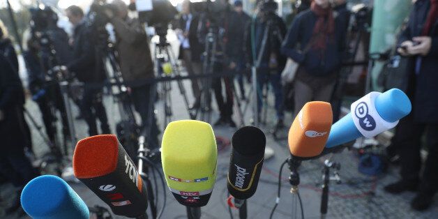 BERLIN, GERMANY - NOVEMBER 17: Television and radio crews' microphones stand ready as politicians arrive for further talks the morning after leaders of the four negotiating parties failed to reach consensus over issues in their preliminary coalition talks on November 17, 2017 in Berlin, Germany. The German Christian Democrats (CDU), its sister party the Bavarian Christian Democrats (CSU), the Free Democratic Party (FDP) and the Greens Party (Buendnis 90/Die Gruenen) have been slogging through three weeks of talks that have shown a reluctance for compromise on certain key issues, making the outcome uncertain. Preliminary coalition talks will continue today. (Photo by Sean Gallup/Getty Images)