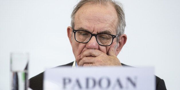 Pier Carlo Padoan, Italy's finance minister, pauses during an event to mark World Savings Day at the Italian Banking Association (ACRI) in Rome, Italy on Tuesday, Oct. 31, 2017. Ignazio Visco won final approval for a second term as Bank of Italy governor, after overcoming a bruising public debate over his handling of the countrys banking crisis. Photographer: Alessia Pierdomenico/Bloomberg via Getty Images