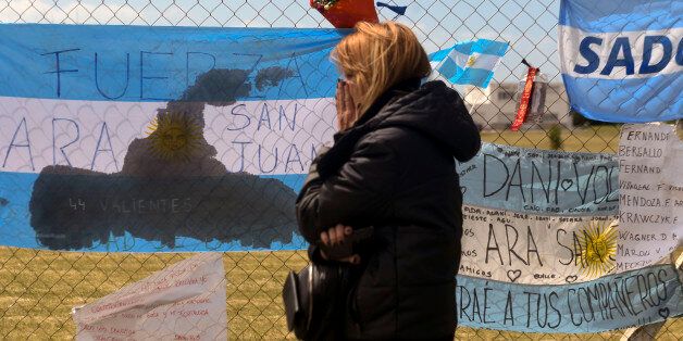 A relative of missing Argentine submarine crew member Alejandro Damian Tagliapietra, expresses her grief outside Argentina's Navy base in Mar del Plata, on the Atlantic coast south of Buenos Aires, on November 24, 2017.Argentina's navy confirmed Thursday that an unusual noise heard in the Atlantic near the last known position of a missing submarine appeared to be an explosion, dashing the last hopes of finding the vessel's 44 crew members alive. Relatives of the missing sailors reacted with grief and anger to the news after holding out hope since the sub was reported overdue at its Mar del Plata base on November 17, two days after the explosion. / AFP PHOTO / EITAN ABRAMOVICH (Photo credit should read EITAN ABRAMOVICH/AFP/Getty Images)