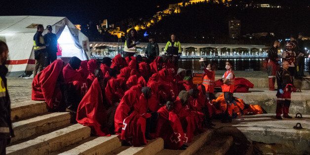 A group of migrants just being rescued in the Mediterranean sea, arrives at the harbour of Malaga, where the Red cross provides a first help. Malaga 11-11-2017 (Photo by Guillaume Pinon/NurPhoto via Getty Images)