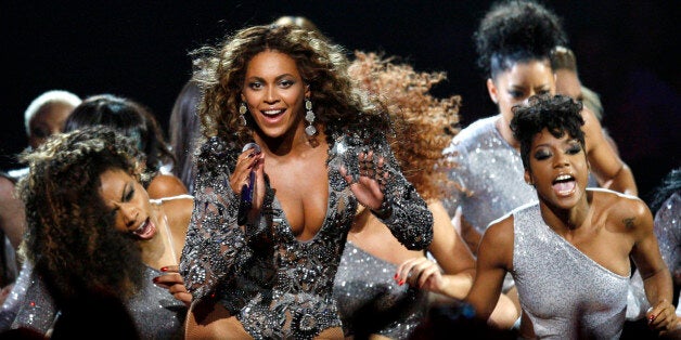 Beyonce (C) performs