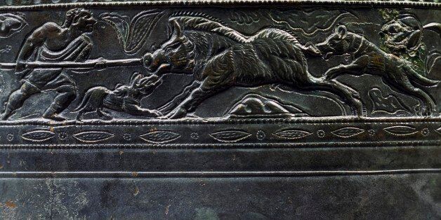 Frieze depicting a boar hunt, detail from a bronze situla. Roman Civilisation, 2nd-3rd century.