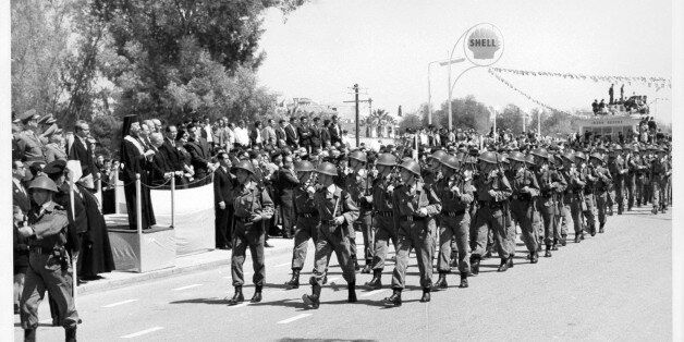 Members of the Greek-Cypriot Army parade past President Makarios during Eoka Day celebrations in Nicosia,Cyrus, 1964. (Photo by Central Press/Hulton Archive/Getty Images)