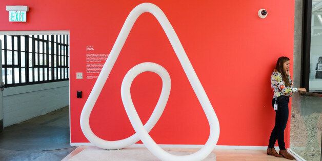 A woman talks on the phone at the Airbnb office headquarters in the SOMA district of San Francisco, California, U.S., August 2, 2016. REUTERS/Gabrielle Lurie