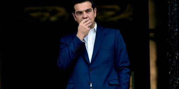 Greek Prime Minister Alexis Tsipras reacts as he waits for the his South Korean counterpart at his office in Athens on October 23, 2017. Greece has slightly revised downwards, to 3.7% from the previously estimated 3.9%, its primary budget surplus in 2016, a result that remains the requirements of its creditors, the EU and the IMF. This announcement, by the Greek statistical agency Elstat, coincides with the return to Athens of its bailout negotiators, for a new round of inspection of the implem