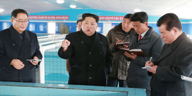 This undated photo released by North Korea's official Korean Central News Agency (KCNA) on November 28, 2017 shows North Korean leader Kim Jong-Un at the newly built Sunchon Catfish Farm in South Pyongan Province. / AFP PHOTO / KCNA via KNS AND AFP PHOTO / - / South Korea OUT / REPUBLIC OF KOREA OUT ---EDITORS NOTE--- RESTRICTED TO EDITORIAL USE - MANDATORY CREDIT 'AFP PHOTO/KCNA VIA KNS' - NO MARKETING NO ADVERTISING CAMPAIGNS - DISTRIBUTED AS A SERVICE TO CLIENTSTHIS PICTURE WAS MADE AVAILABLE BY A THIRD PARTY. AFP CAN NOT INDEPENDENTLY VERIFY THE AUTHENTICITY, LOCATION, DATE AND CONTENT OF THIS IMAGE. THIS PHOTO IS DISTRIBUTED EXACTLY AS RECEIVED BY AFP. / (Photo credit should read -/AFP/Getty Images)