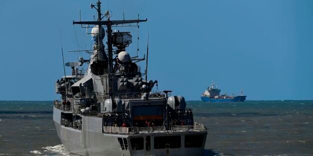 Argentina's Navy destroyer ARA Sarandi sails off to take part in the search of missing submarine ARA San Juan, from the north breakwater of Argentina's Navy base in Mar del Plata, on the Atlantic coast south of Buenos Aires, on November 21, 2017.An international search mission for a missing Argentine submarine entered its sixth day Tuesday as uncertainty over the fate of its 44 crew members gave way to rising anguish for families troubled by earlier false hopes. / AFP PHOTO / EITAN ABRAMOVICH (Photo credit should read EITAN ABRAMOVICH/AFP/Getty Images)