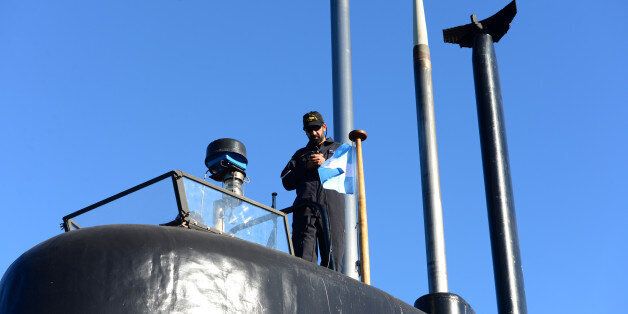 A crew member of the Argentine military submarine ARA San Juan stands on the vessel at the port of Buenos Aires, Argentina June 2, 2014. Picture taken on June 2, 2014. Armada Argentina/Handout via REUTERS ATTENTION EDITORS - THIS IMAGE WAS PROVIDED BY A THIRD PARTY.
