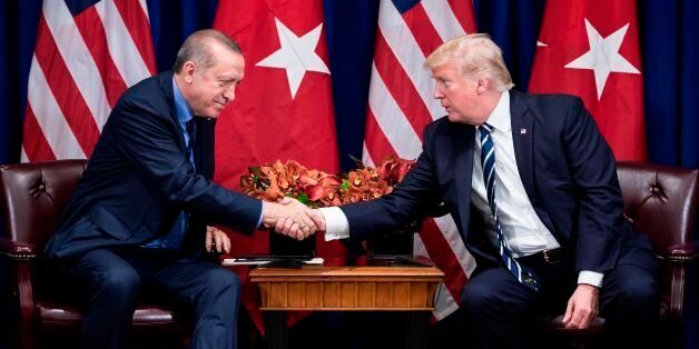 Turkey's President Recep Tayyip Erdogan and US President Donald Trump shake hands before a meeting at the Palace Hotel during the 72nd United Nations General Assembly on September 21, 2017 in New York City. / AFP PHOTO / Brendan Smialowski (Photo credit should read BRENDAN SMIALOWSKI/AFP/Getty Images)